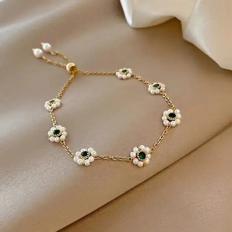 Daisy-Inspired Gold Bracelet with Green Crystals - MABEL LONDON